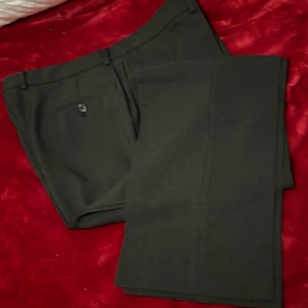 Men’s dress pants. Black, brand new.